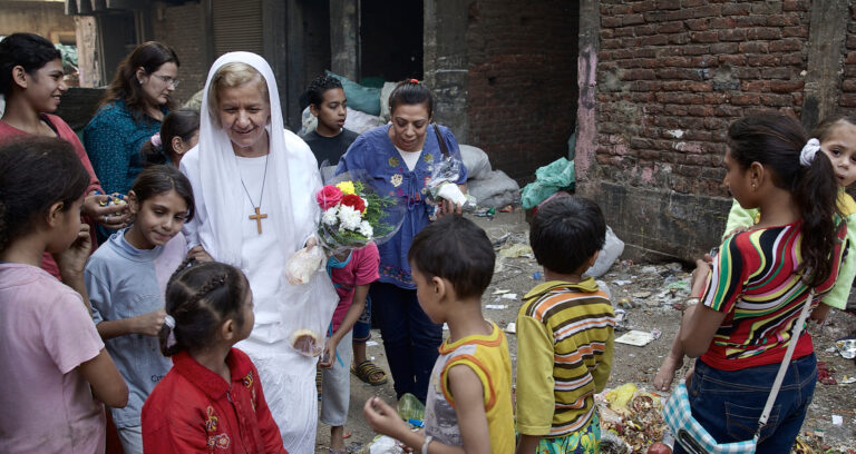 Mama Maggie with people on the streets in Egypt